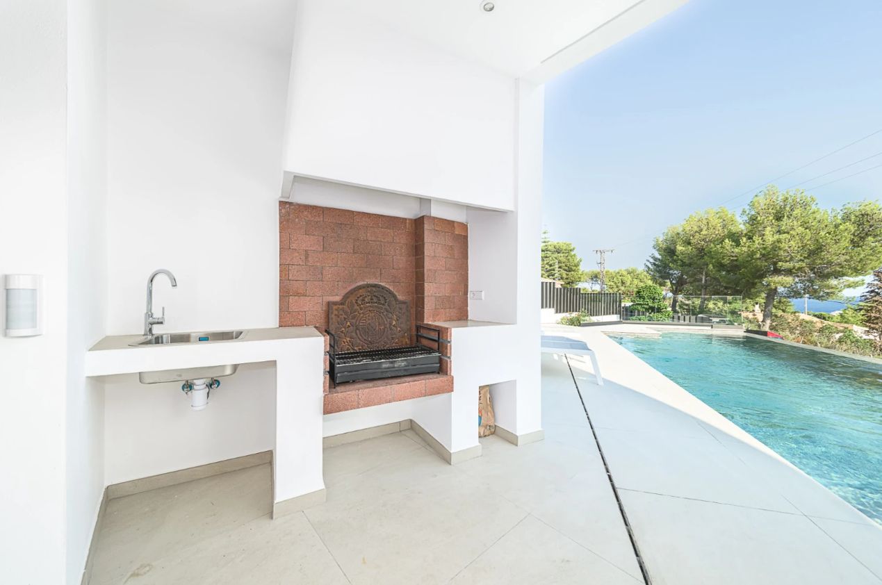Villa con vistas al mar en La Fusteria - Benissa