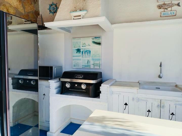 Villa rénovée avec vue panoramique et parcelle constructible supplémentaire à El Rafalet, Jávea