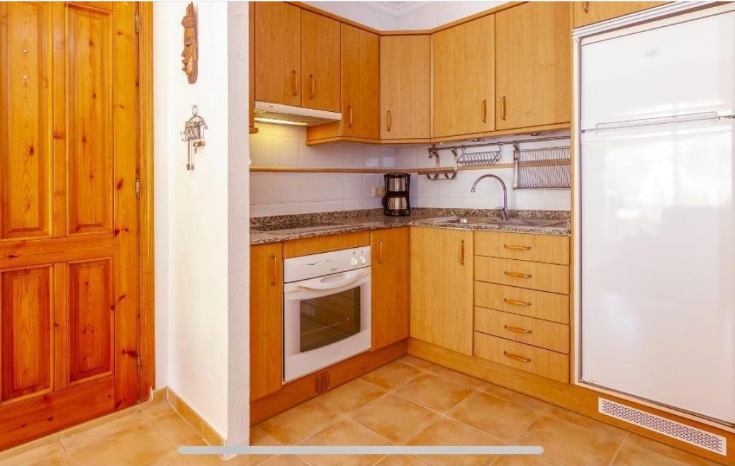 Apartamento en la planta baja con jardín y gran piscina en Cumbre del Sol.