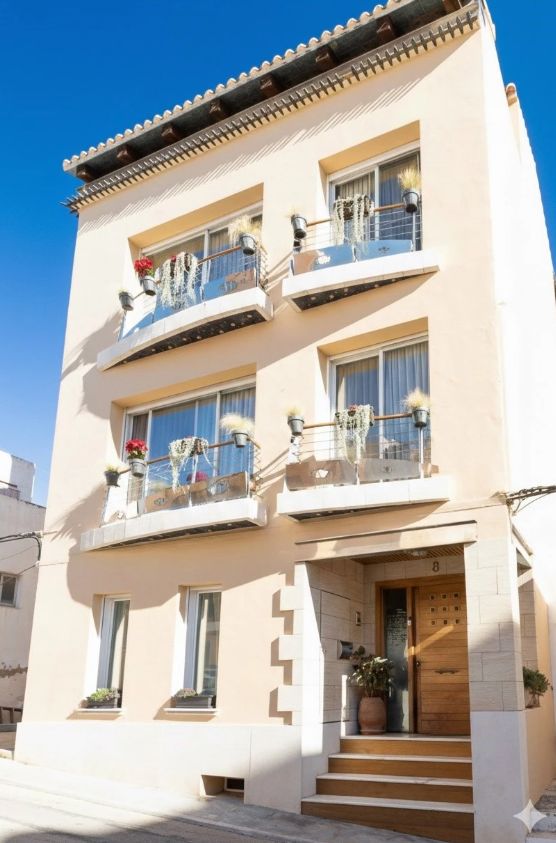 Casa adosada con spa propio, apartamentos independientes y vistas panorámicas al mar en  Javea
